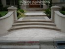 Sand Wash Concrete with Pre-Cast Concrete Border and Bull Nosed Step Treads and Wall Cap. Tile Field. Stucco Walls wth Pre Cast Concrete Pilasters