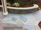 Bitter Root Ledge Stone Veneer Wall and  Bluestone  Flagstone Wall Caps and Inlay Noiyo Pebble Exposed Aggregate Concrete