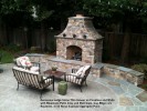 Kennesaw Ledge Stone Thin Veneer on Fireplace and Walls  with Bluestone Patio Inlay and Wall Caps. Cap Edges are  Routered. 3_16 Noiyo Exposed Aggregate Patio