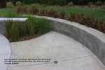 Light Sand Wash Finish Patio with Square Nosed Pre-Cast Concrete Coping and Tile Pool Wall Cap. Poured in Place Concrete Seatwall 2