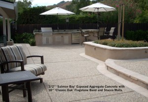 2” ‘Salmon Bay’ Exposed Aggregate Concrete with 10” ‘Classic Oak’ Flagstone Band and Stucco Walls 